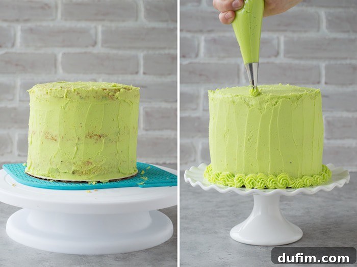 Homemade funfetti cake with lime green buttercream! A top-down view showing the intricate shell border piping, colorful sprinkles, and the central DIY balloon cake topper, ready to impress guests.
