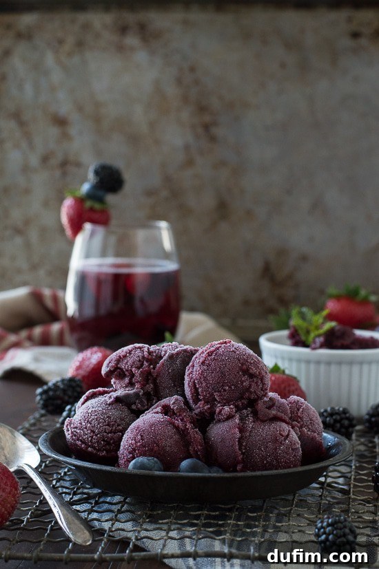A beautifully presented bowl of homemade Berry Sangria Sorbet, ready to be served.