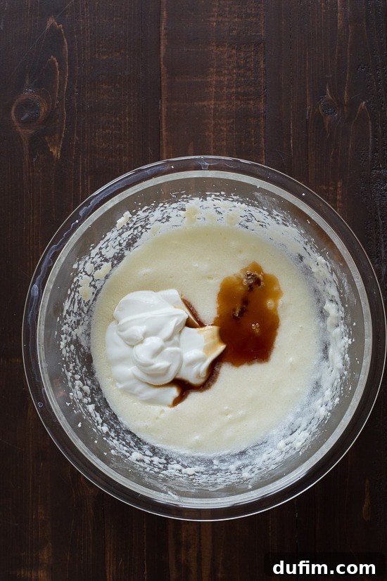 Adding sour cream and vanilla to cake batter