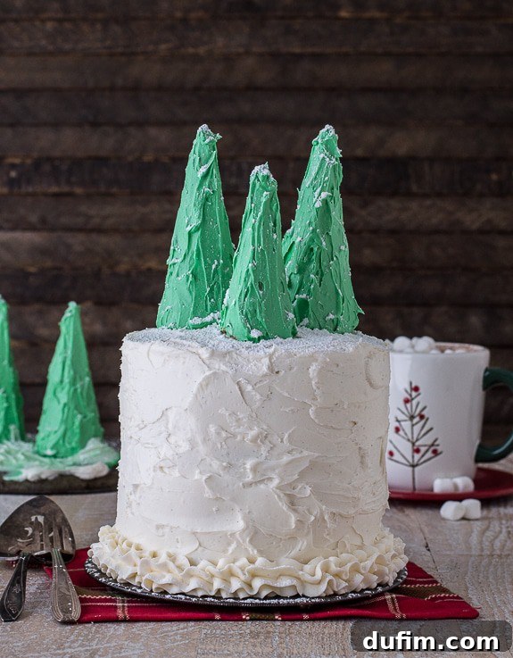 A beautifully decorated gingerbread cake, ready to be sliced and served for a holiday gathering
