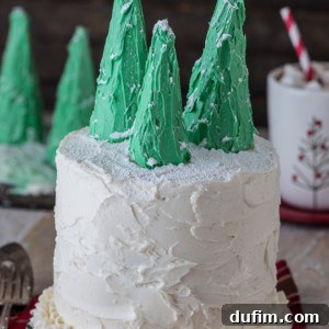 Easy gingerbread cake with vanilla bean buttercream, topped with snowy christmas trees!