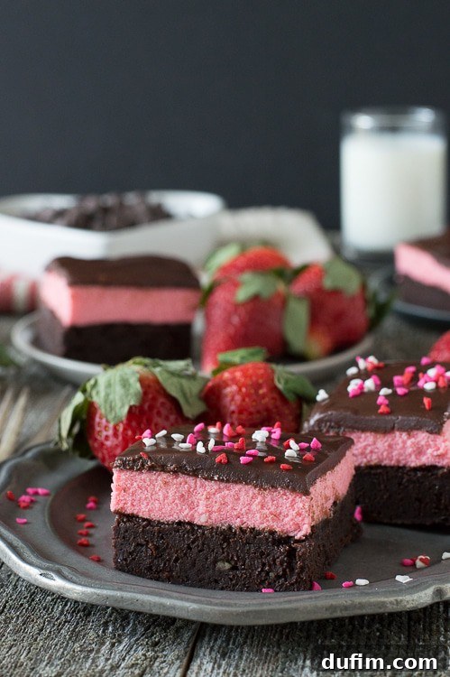 The Flavors That Defined 2015 6 Elegant Layered Strawberry Mousse Brownies with distinct pink and brown layers