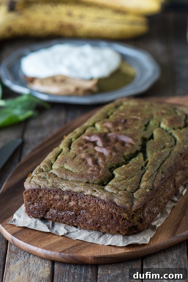 Individual slices of green monster bread arranged on a wooden board, ready to be enjoyed.