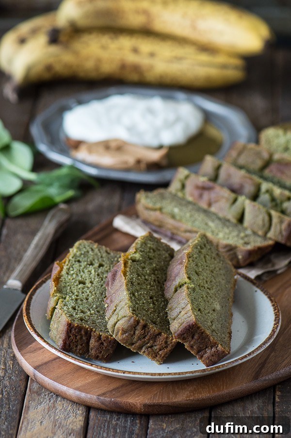 A charming close-up of Green Monster Bread slices, inviting viewers to take a bite.