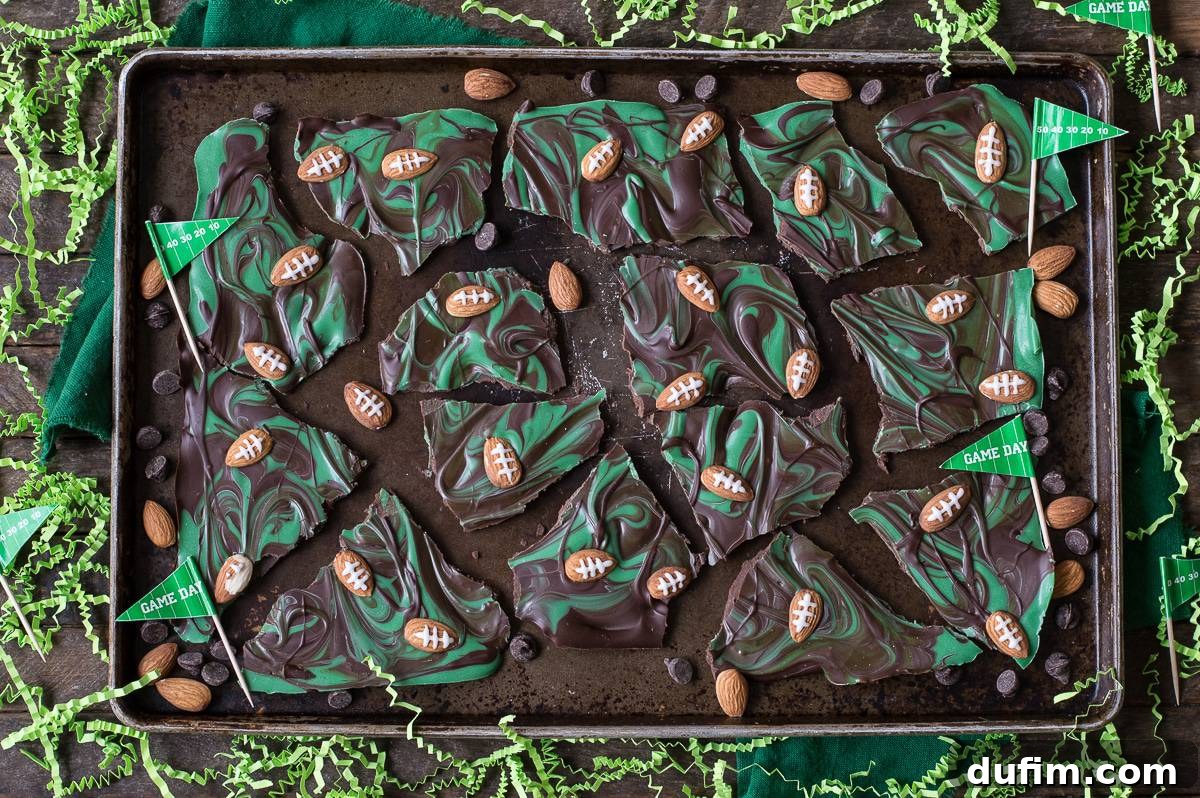 Football Bark arranged on a clean white serving tray, ready to be presented at a Super Bowl party.