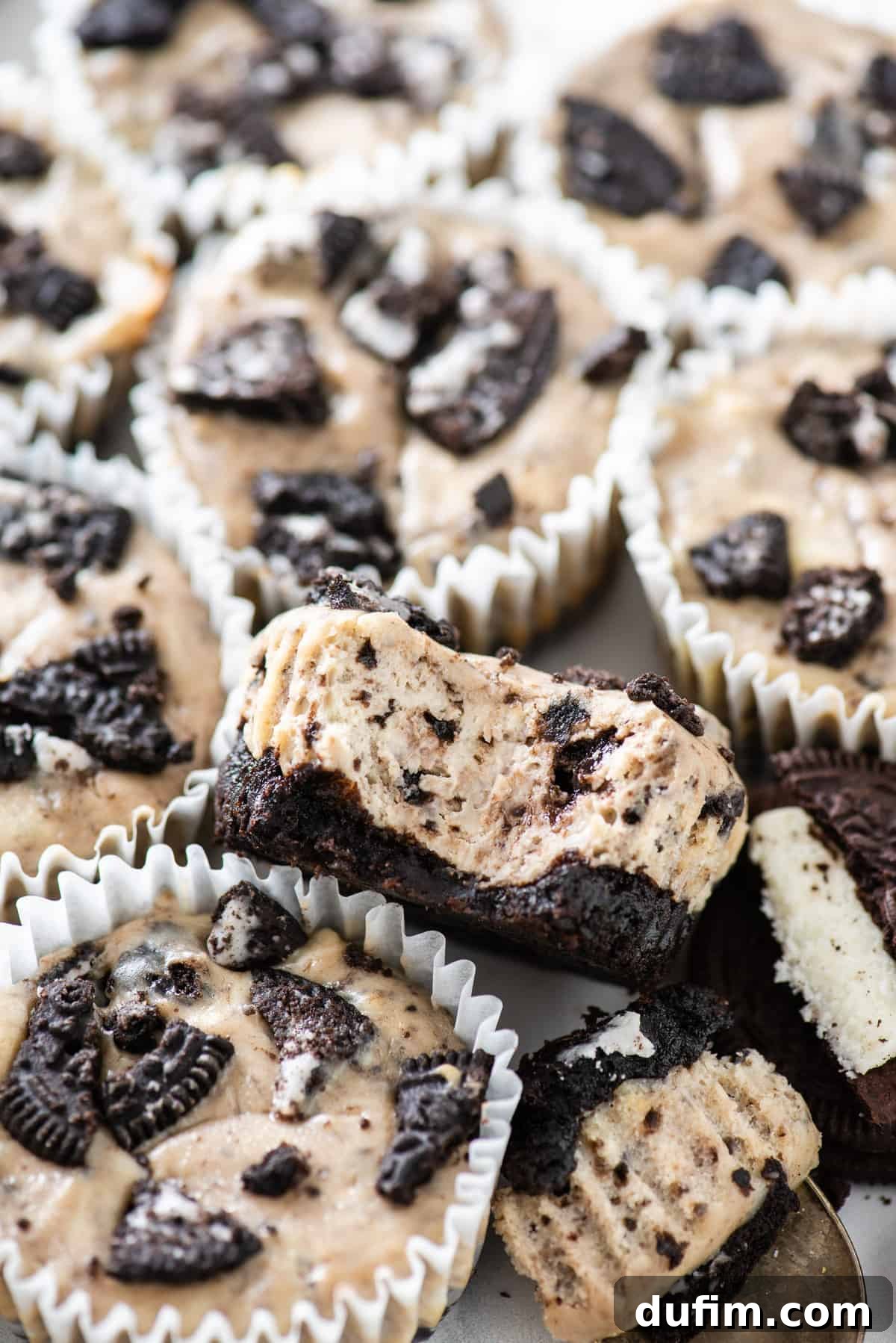 oreo cheesecakes arranged close together on white background