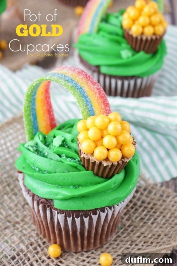 Festive Pot of Gold Cupcakes topped with green frosting and whimsical rainbow candy, ready to celebrate.