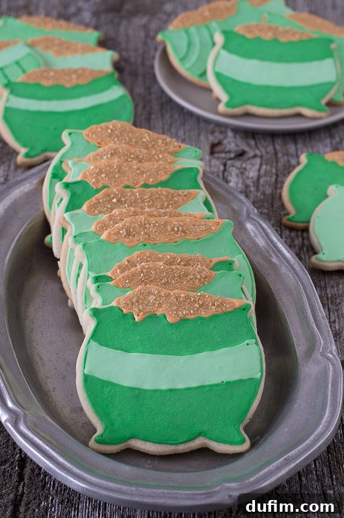 Charming Pot o’ Gold Cookies presented on an elegant silver platter.