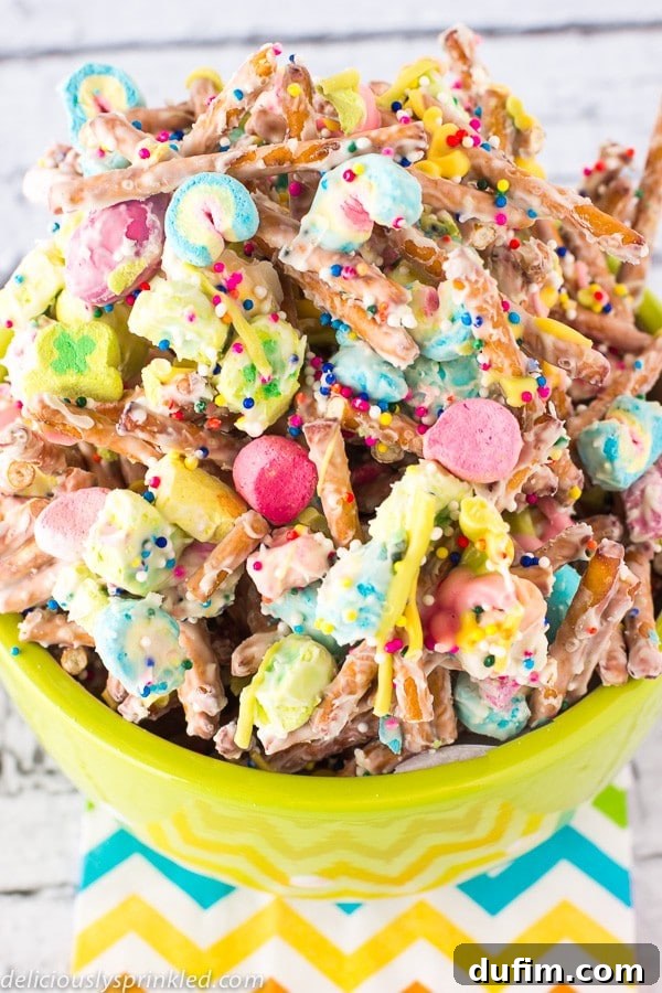 A generous serving of Lucky Charms Munch presented in a large, inviting yellow bowl.