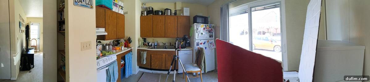 Behind-the-scenes panorama of a food blogger's kitchen during a photoshoot