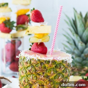 Fresh pineapple strawberry smoothie in a pineapple cup!