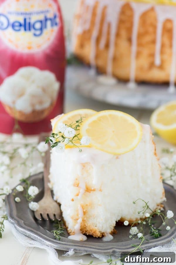 Rustic lemon angel food cake with fresh lemon slices