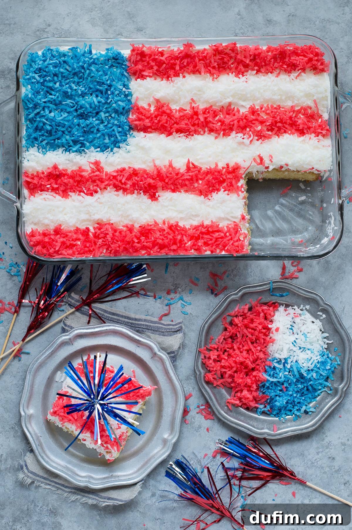 Stars and Stripes Celebration Cake 5 A slice of American Flag Cake showing the layered coconut topping on a fluffy cake base.