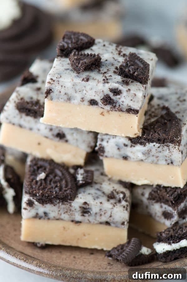 Peanut Butter Oreo Explosion Fudge 5 All the 4 ingredients laid out for making the peanut butter Oreo fudge: vanilla candiquik, sweetened condensed milk, creamy peanut butter, and Oreos.