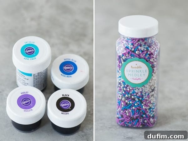 A selection of gel food colorings in black, purple, teal, and blue, essential for creating the multi-colored galaxy cake effect.