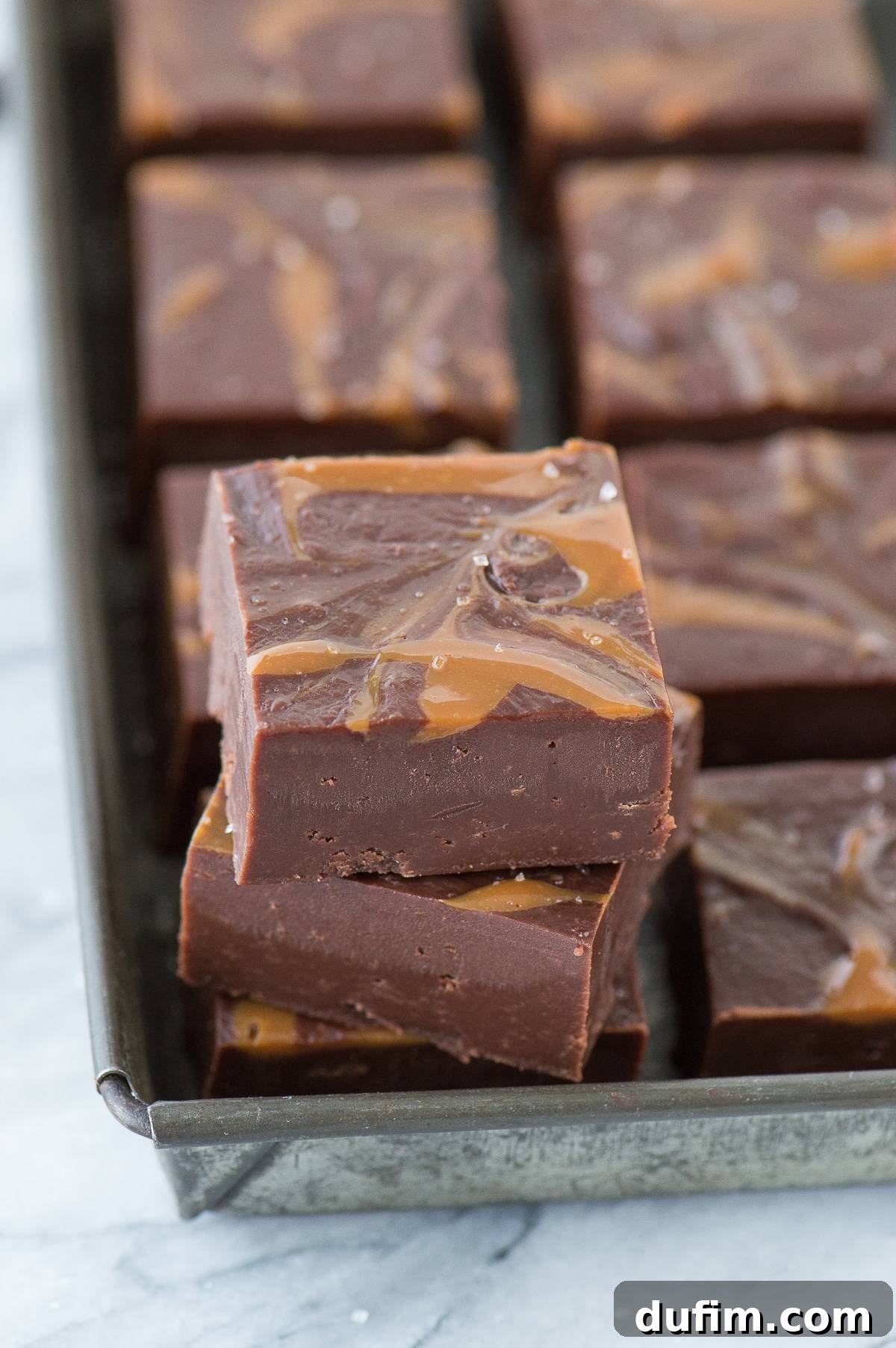Close-up of freshly made Salted Caramel Mocha Fudge with visible swirls of dulce de leche