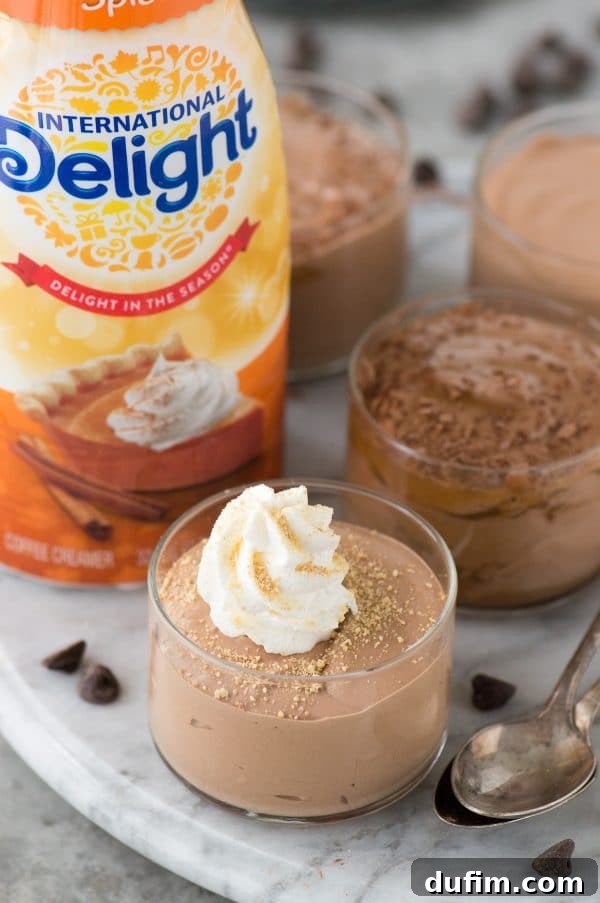 Individual serving bowls of homemade 3-ingredient coffee creamer mousse, freshly prepared and ready to be chilled to perfection.