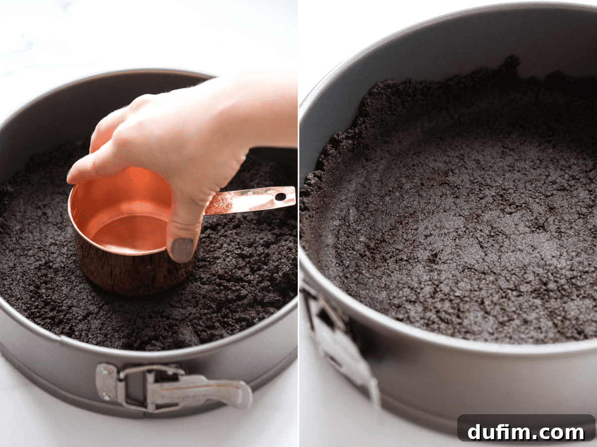Perfectly pressed Oreo crust in a springform pan, ready for the cheesecake filling.