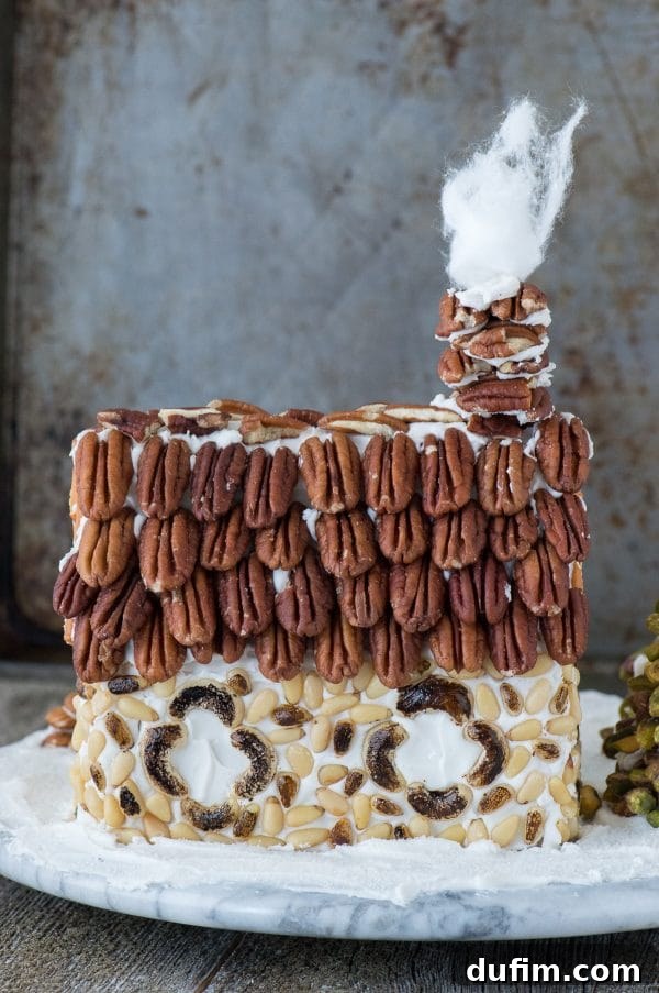 Festive Gingerbread Folly 9 Gingerbread house sidewalk made from finely diced walnuts, bordered by larger walnut pieces.