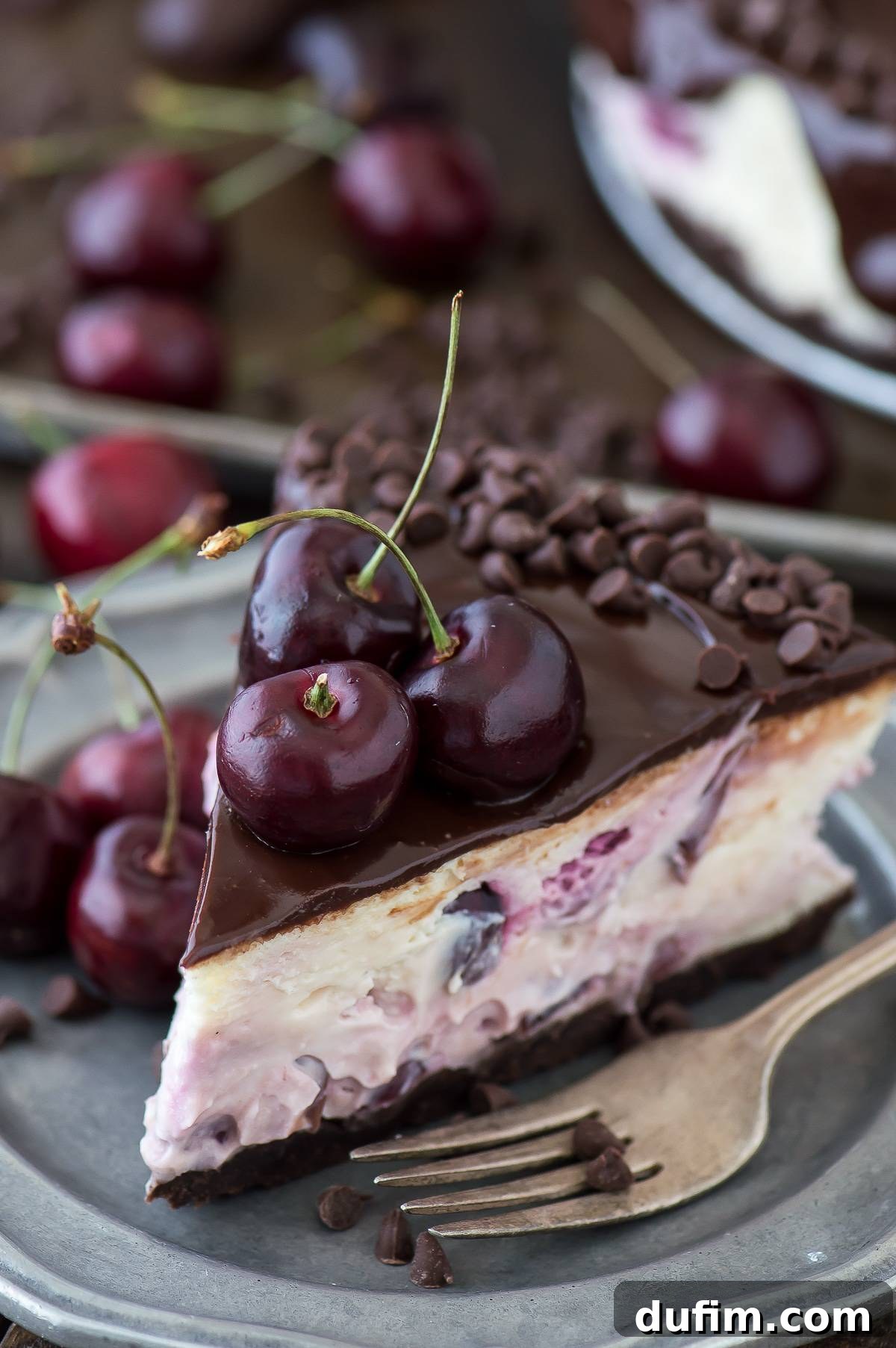 Decadent Chocolate Cherry Cheesecake with dark chocolate and fresh cherries