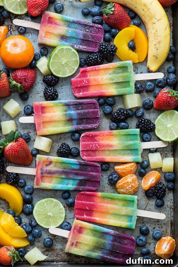 Vibrant Rainbow Popsicles, a fun and colorful frozen treat