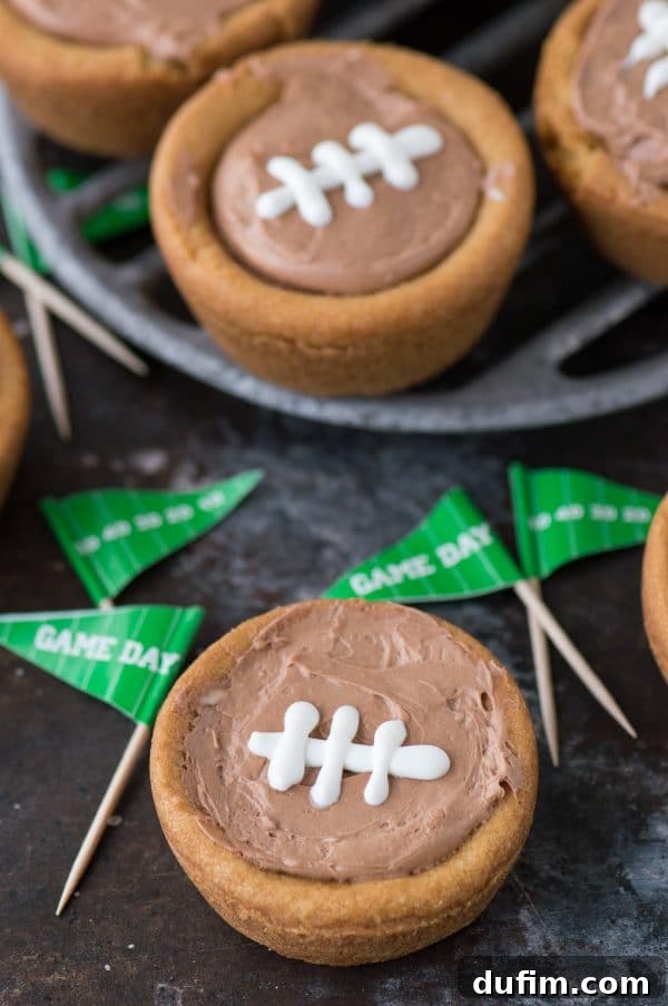 Game Day Flags and cheesecake sugar cookie football cups, a festive football party dessert spread