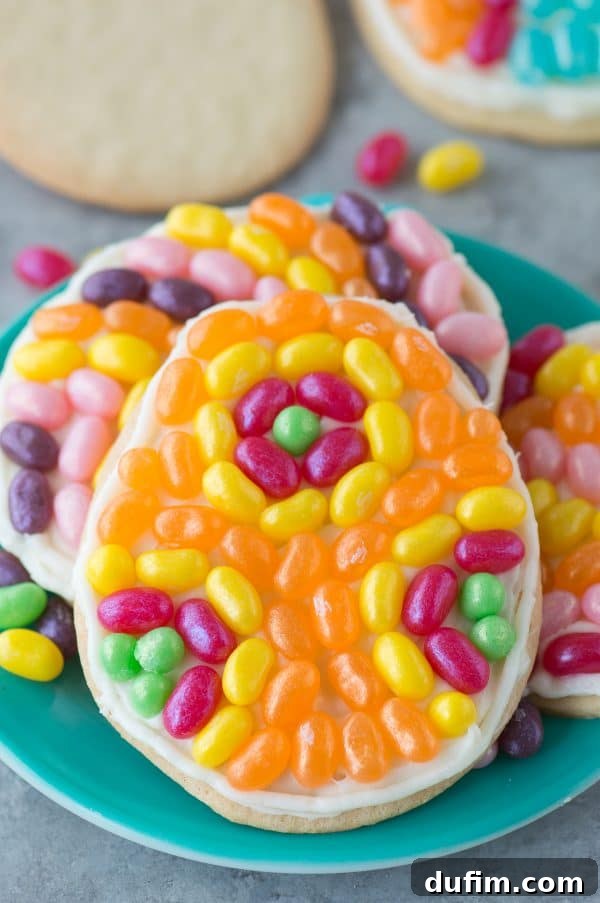 A close-up shot of Easter egg cookies adorned with intricate patterns made from colorful Jelly Belly jelly beans, emphasizing creative decoration and the festive spirit.
