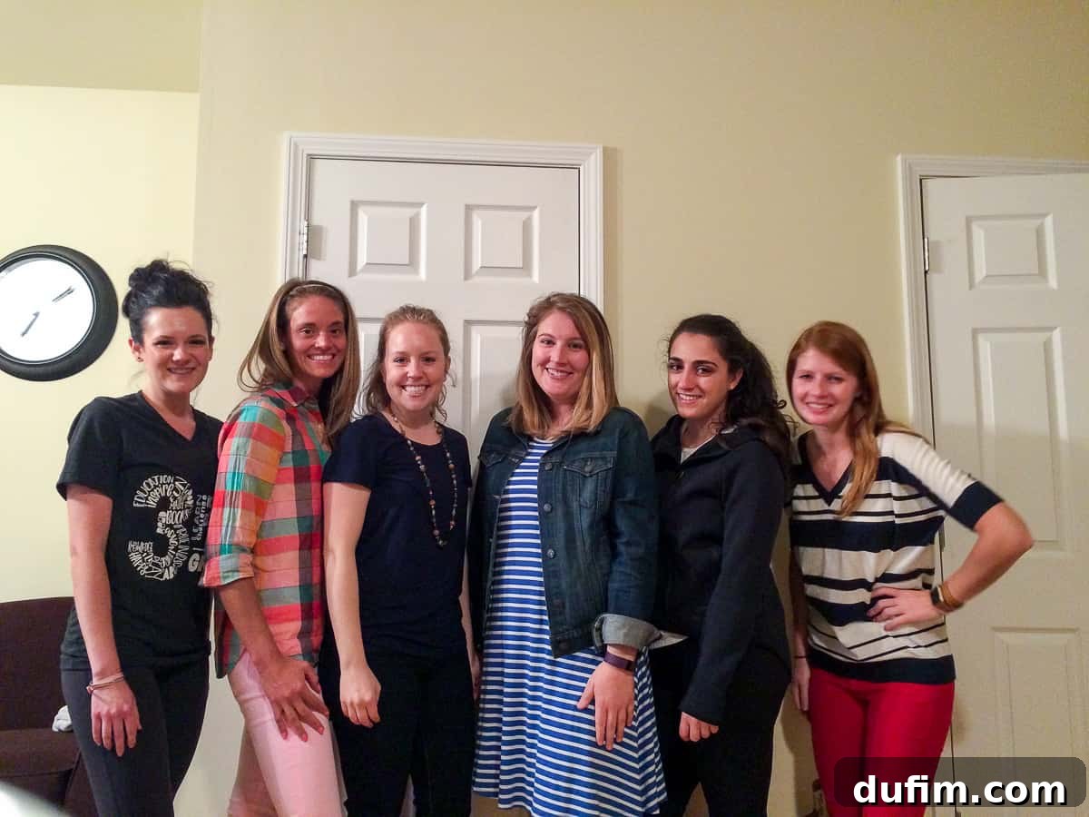 A group of women gathered together, smiling and embracing, signifying a cherished final bible study meeting before a big move, symbolizing deep spiritual connection and friendship.