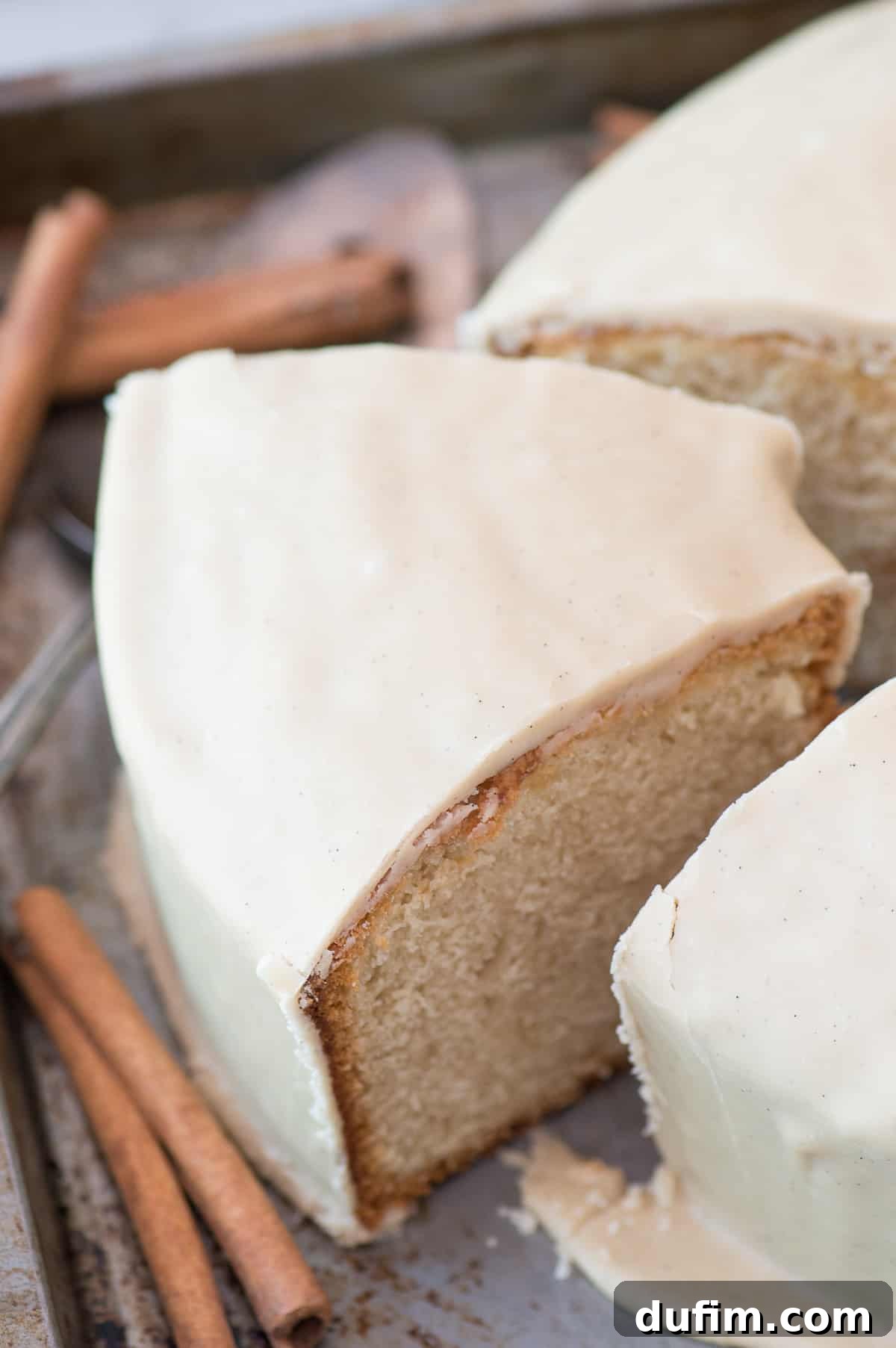 A close-up shot of the perfectly baked brown sugar pound cake, still in its angel food cake pan, radiating warmth and home-baked goodness.