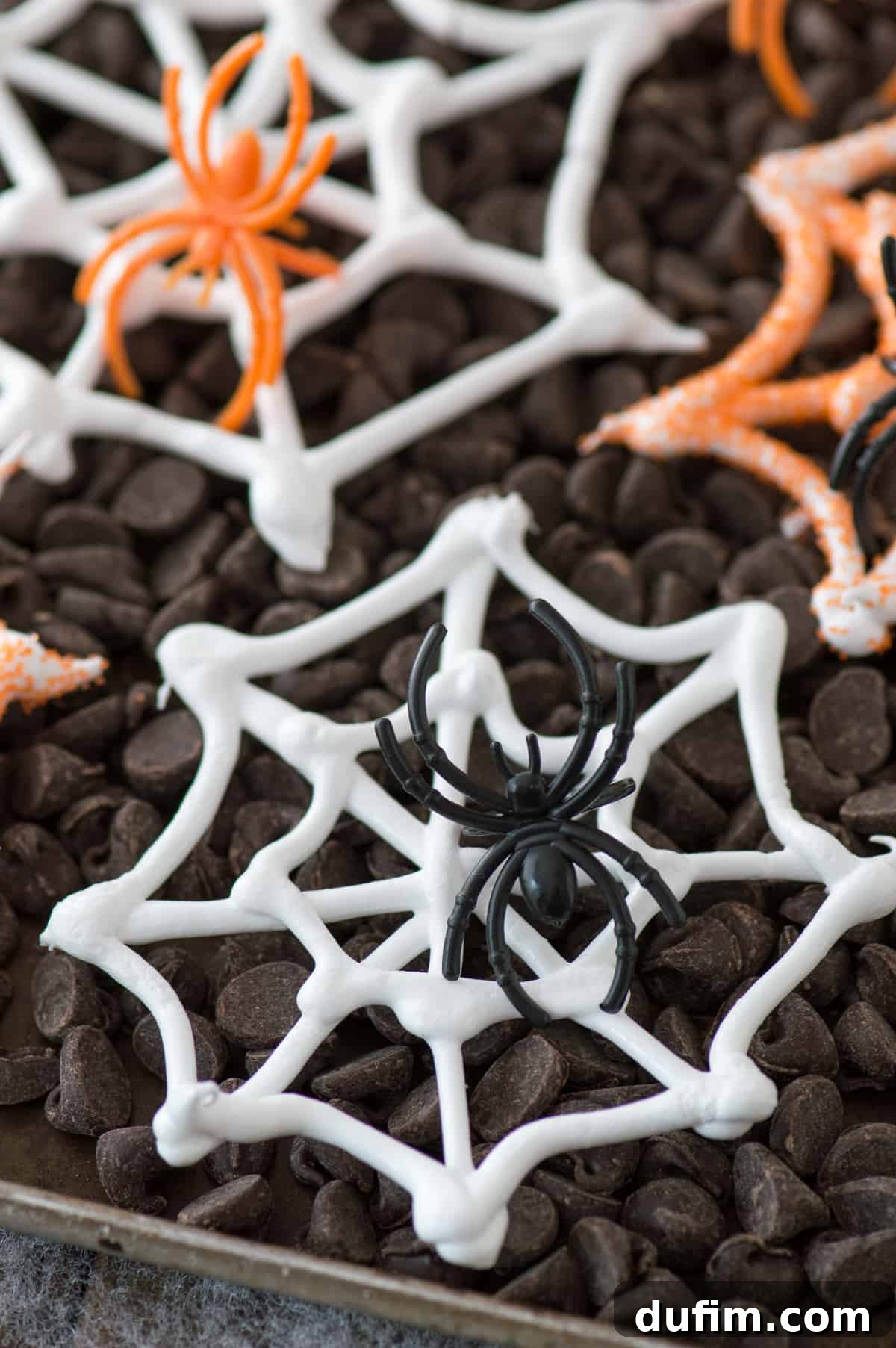 Lacy Meringue Webs 3 An easy Halloween treat - edible spider web meringues! Display these spider webs with plastic spider rings for a spooky look!