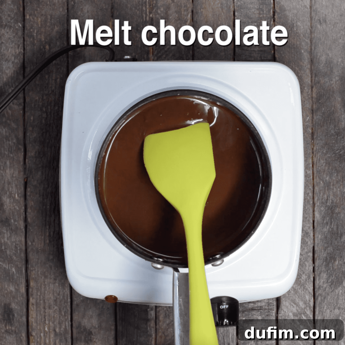 Fully melted and glossy semi-sweet chocolate mixture in a pot, ready for swirling.
