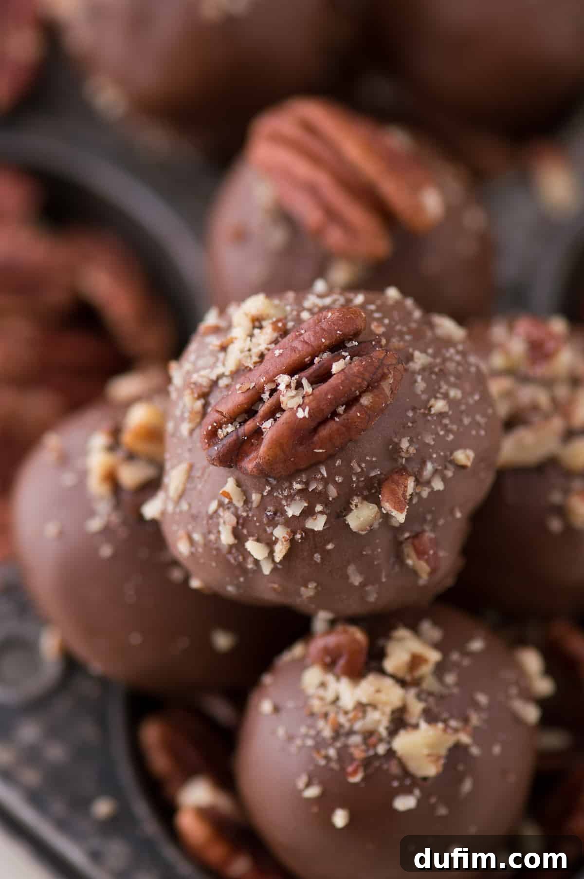 Decadent Turtle Oreo Truffles 2 Delicious Oreo balls covered in chocolate and topped with a pecan