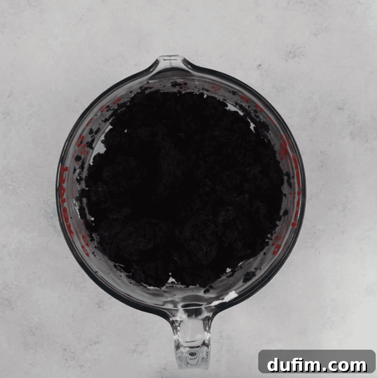 Decadent Turtle Oreo Truffles 6 Close-up of the mixed Oreo ball dough in a glass bowl