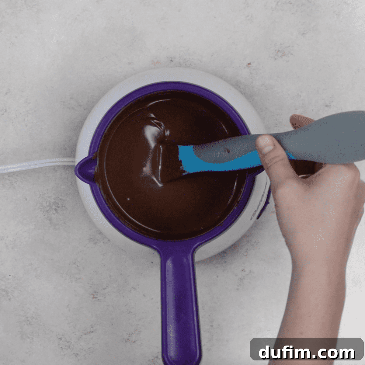 Decadent Turtle Oreo Truffles 9 Melting chocolate almond bark in a small saucepan