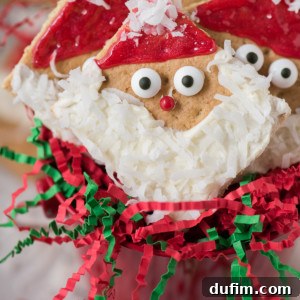 Easy to make Santa Graham Crackers are the perfect edible treat to make at home with your kids or at a school Christmas party! You can buy all the supplies at the grocery store, ZERO prep involved!