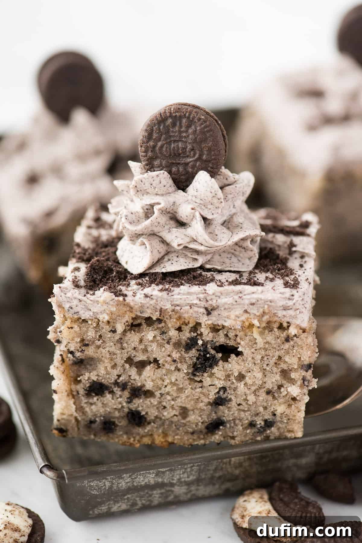 Slice of Oreo pan on metal spatula