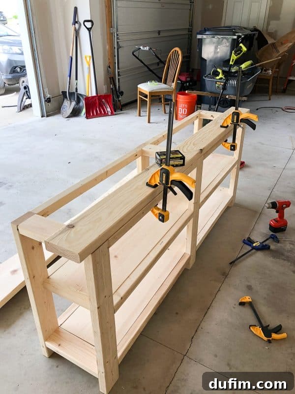 Attaching the solid wood top boards to the console table frame