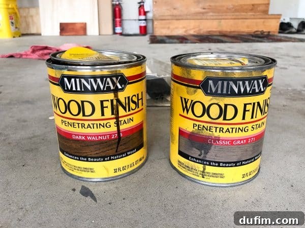 Applying the initial coat of classic gray stain to the console table