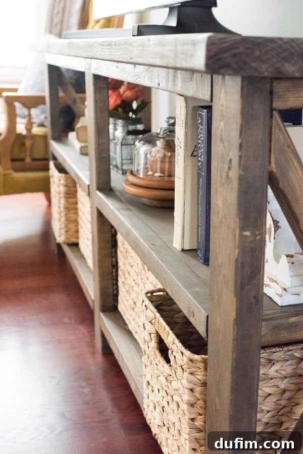 Close-up of the farmhouse console table's leg and lower shelf structure