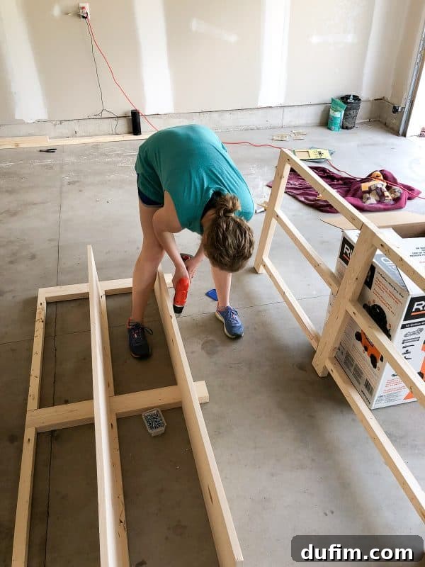 Securely clamping and screwing the console table's structural elements together
