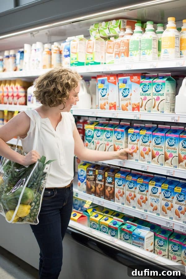 woman shopping in a grocery store, demonstrating authentic brand photography