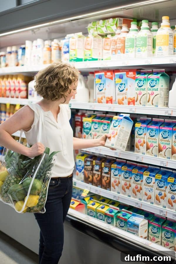 woman shopping for brand product in a grocery store, using a clear tote bag as an accessory