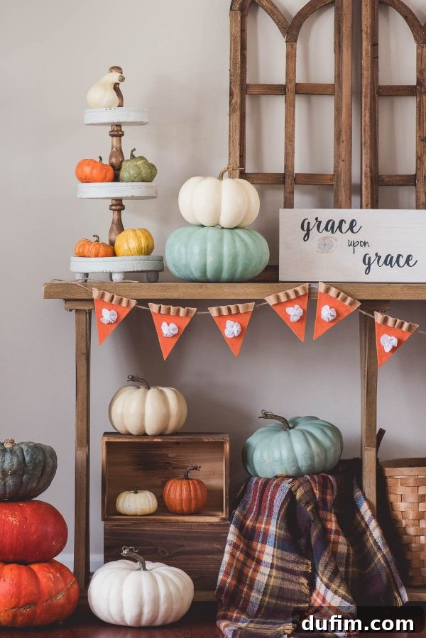 DIY Felt Pumpkin Pie Garland: A Detailed Thanksgiving Craft Tutorial Handmade felt pumpkin pie garland banner displayed against a rustic wooden background for Thanksgiving decor.