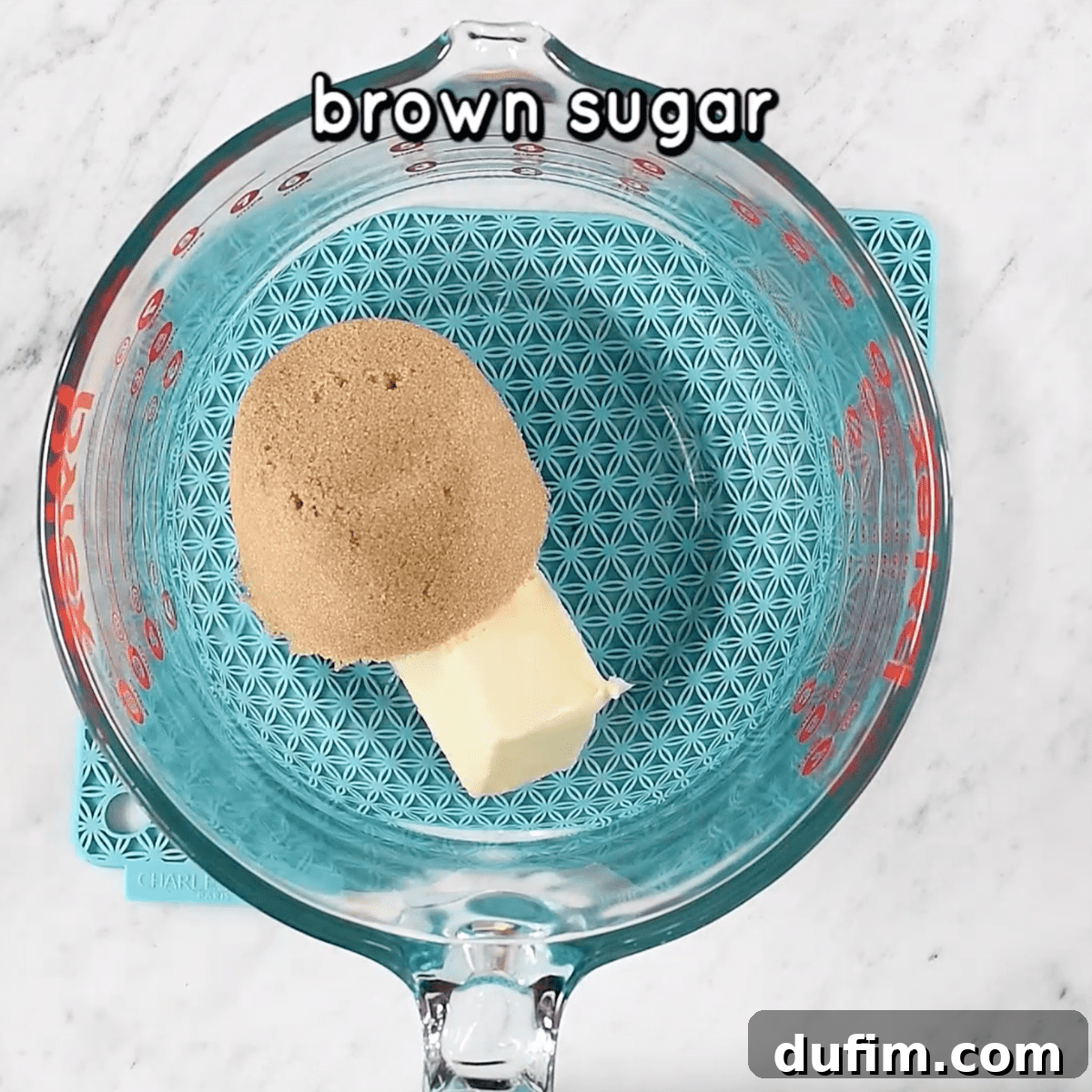 Irresistible MM Chocolate Chip Cookies 2 butter and brown sugar in glass mixing bowl