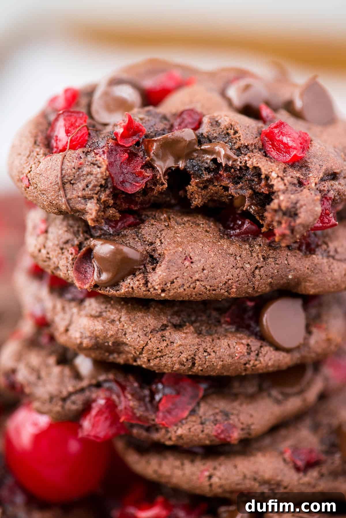 black forest cookies with maraschino cherries and chocolate chips with bite taken out