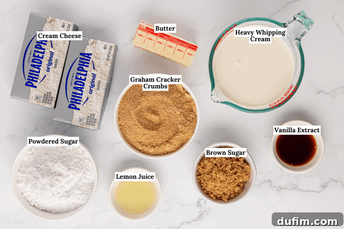 Whip Up a Philadelphia No Bake Cheesecake 4 A visually appealing arrangement of all the key ingredients needed for a Philadelphia no-bake cheesecake, artfully displayed on a pristine white surface. Each item—cream cheese, butter, heavy whipping cream, graham cracker crumbs, powdered sugar, lemon juice, brown sugar, and vanilla extract—is clearly visible and perfectly organized for preparation, showcasing the simplicity of the recipe's components.