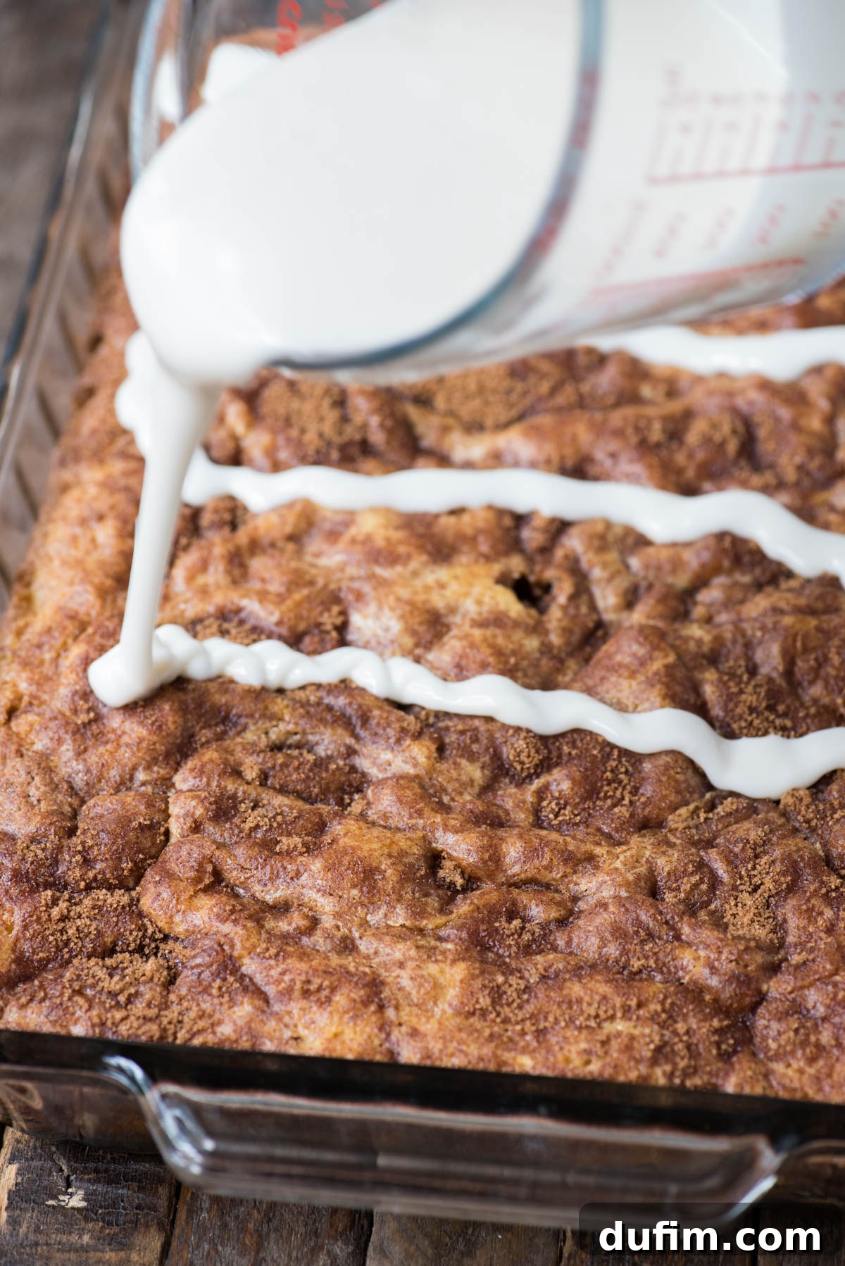 Effortless Apple Spice Coffee Cake 11 A freshly baked apple coffee cake, golden brown and perfectly risen, cooling in its 9x13 inch glass pan.