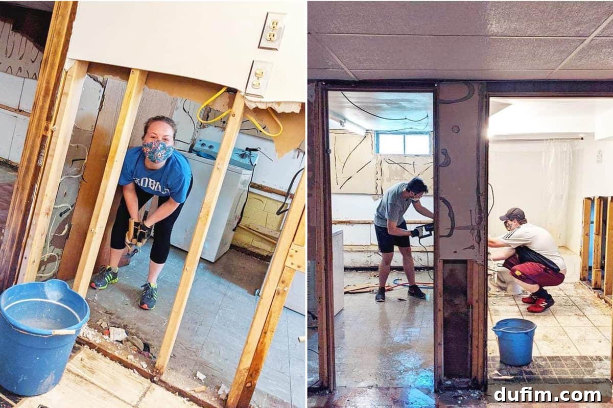 Volunteers working on flood-ravaged homes, with debris piled high outside, symbolizing widespread community aid