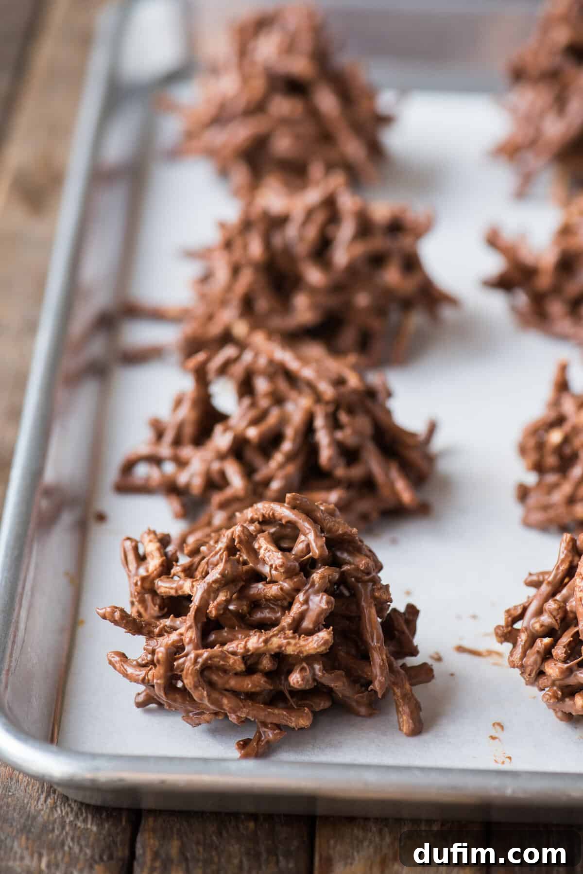 chocolate haystack cookies on baking sheet