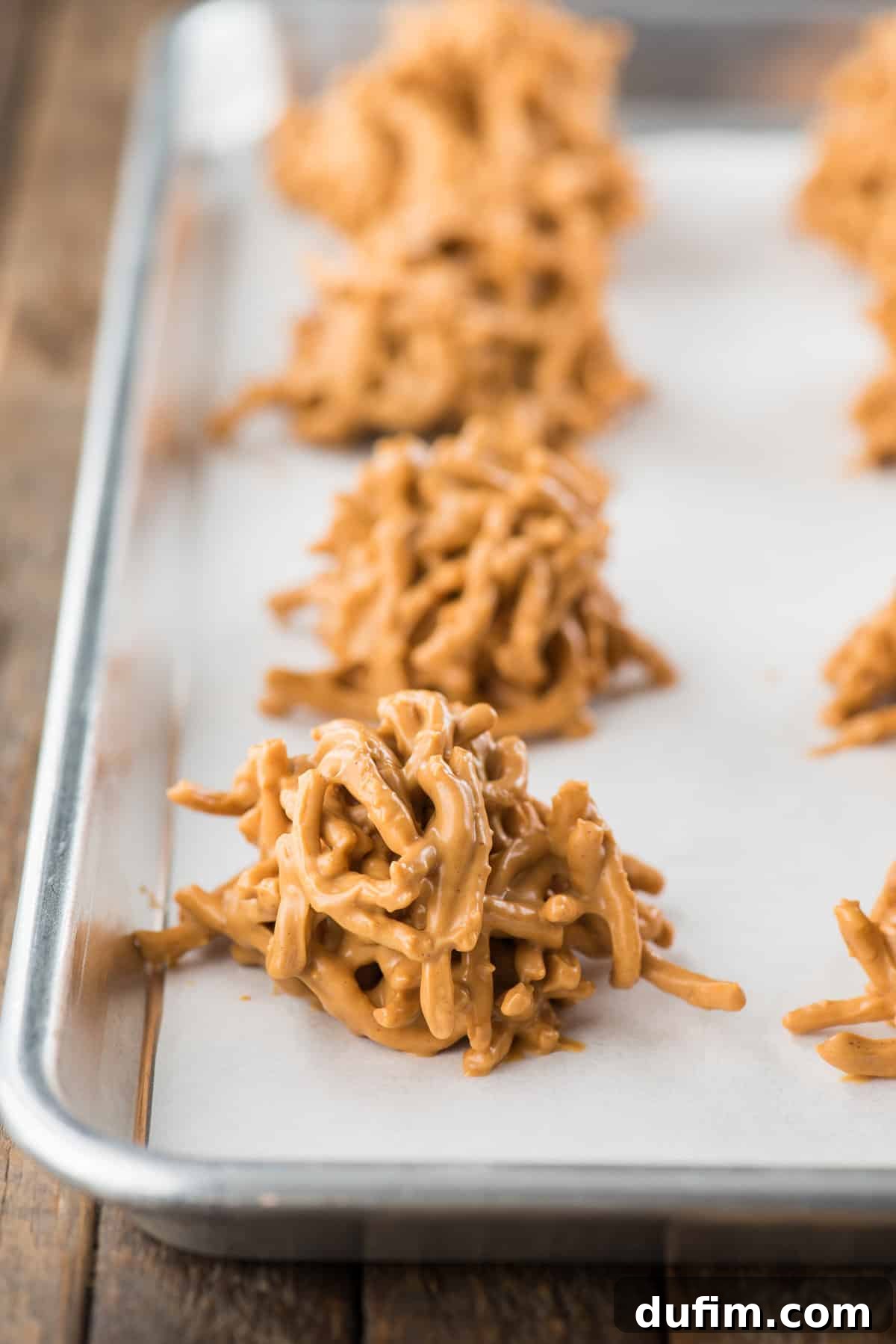 butterscotch haystack cookies on baking sheet